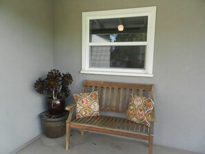 Enjoy a cup of coffee in the morning on the front porch