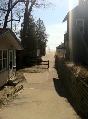 View of the beach, just steps away-cottage on left.