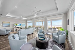 This newer 3 story oceanfront home was built for large groups.