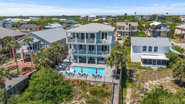 This 3 story oceanfront pool home is magnificent and has every amenity.