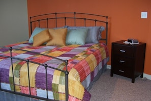 Master suite, wrought iron king bed