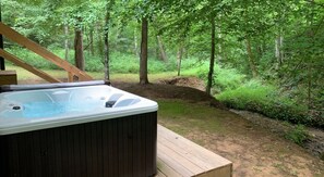 Relax in the hot tub and enjoy nature