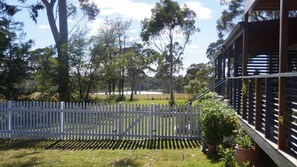 View to the East from enclosed yard in front of Little Finchley's gated deck.