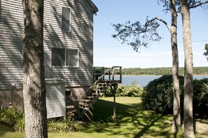 Outdoor Hot Water Shower and View of Back Yard