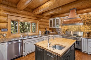 Large kitchen with mostly everything one needs for cooking a feast