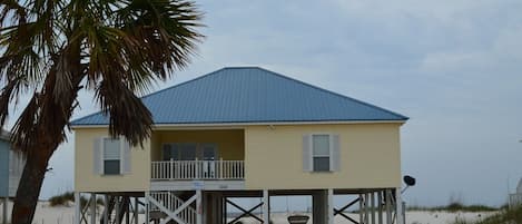 Plenty of parking under house; gulf is seen through the carport