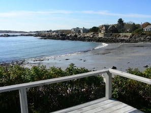 Quiet beach in the cove--view from the deck at low tide--lots of sand.