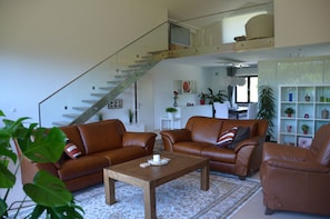 Living Room looking towards Dining Room with view of Loft Area