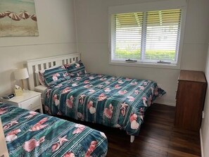 Second bedroom. Queen bed and single bed.