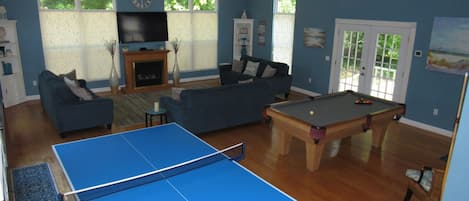 Multipurpose Room, Over Sized Windows, Fire place, 60"  TV, Tennis & Pool Tables