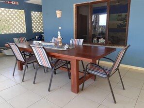 Terrace dining area with ocean view