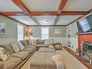 two living rooms with large HDTV