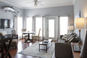 Main living area with flat screen tv and dining table