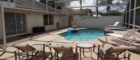 HUGE PRIVATE POOL AREA WITH ENTRY FROM LIVING ROOM AND MASTER BEDROOM!!