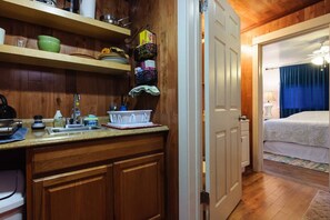 Private Entrance into the kitchen and then through the bathroom into the bedroom