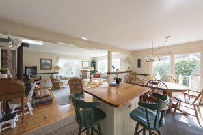 open dining area -     no wall to wall carpet floors - just warm pine boards