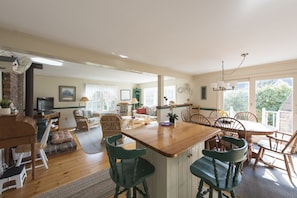 open dining area -     no wall to wall carpet floors - just warm pine boards