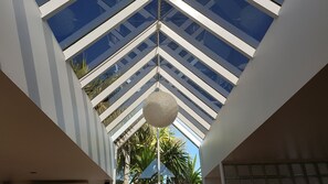 Big glass atrium roof in the living area