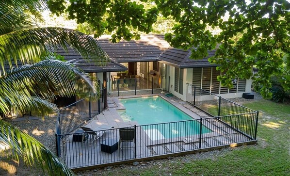 Roya on Mission - Drone showing pool and house exterior