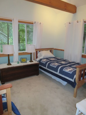 Second bedroom twin bed with extra long mattress 