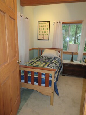 Second bedroom twin bed with extra long mattress 