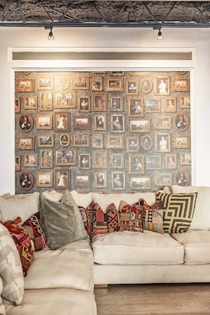 Detail of wallpaper and sofa.