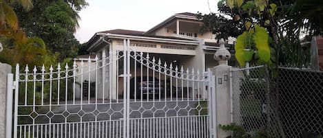 Property Entrance - Wrought Iron gate with House Number "27" on right pillar