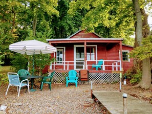 your lake access, porch, dock 50' of shoreline, red building is storage.