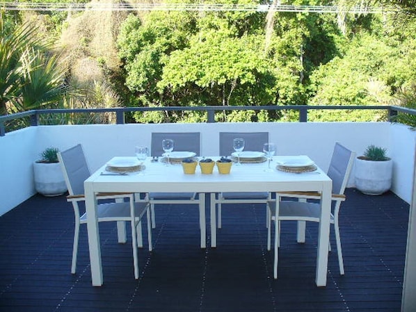 Sunny deck across the road and through the trees to the main Sawtell beach.
