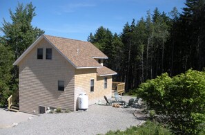 A back  and side view of Woodland Cottage III