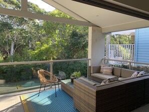 Covered all weather large back verandah.  Lounge seating & BBQ