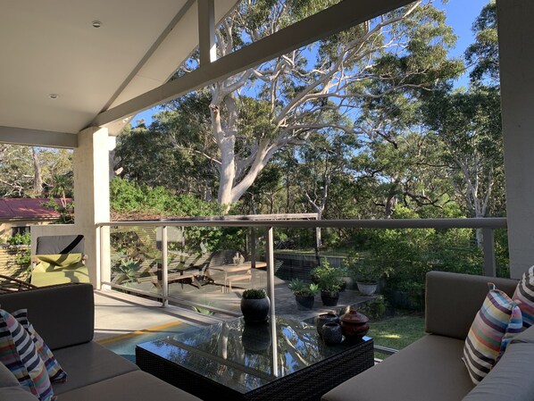 Gorgeous bush view from the covered back balcony with BBQ and  lounge setting