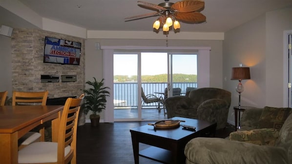 Living room.  There is a large wall mounted television.  Main Channel View!