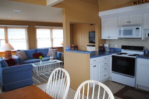 Upper level kitchen was completely renovated. Equipped with a dishwasher.