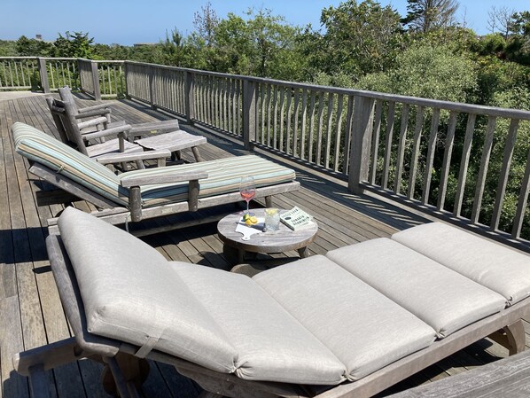 Picture yourself and a cocktail on this deck...