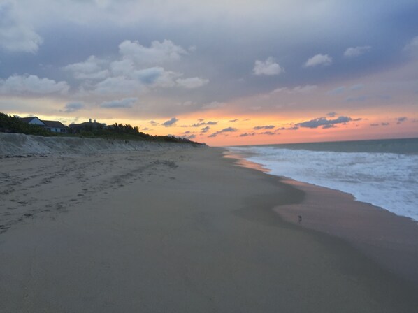 Private ocean beach access looking north at sunset