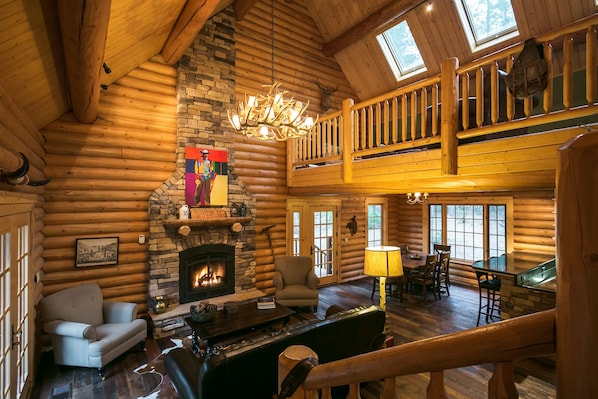 Main living room with vaulted ceiling