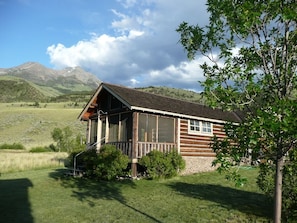 Cabin porch in July