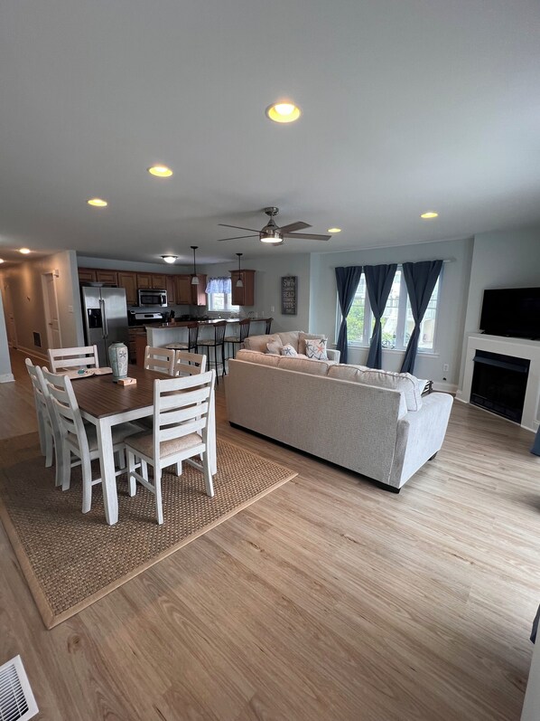 Living area with Seating for 6 at table and 4 counter stools