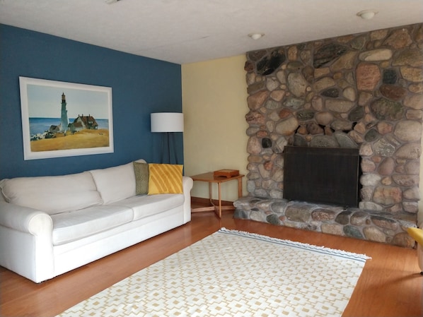 Family room with woodburning fireplace.  Great place for family to gather