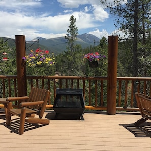 View from top deck.  Beautiful flowers are everywhere!  Hot Tub on this deck!