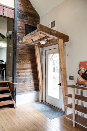 The oak wall by the door is 100 years old.