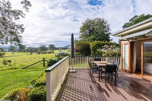 North facing deck overlooking the next door farm and distant hills