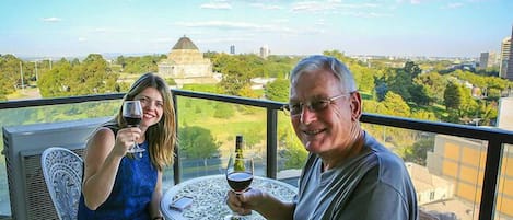 My father and wife enjoying the balcony