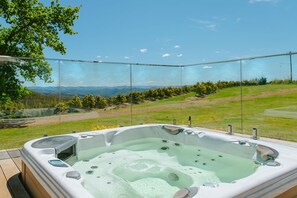 A warm spa during the day or under the stars.