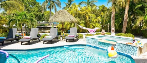 Heated Pool and Hot Tub in the tropical backyard at Sirenia By The Sea