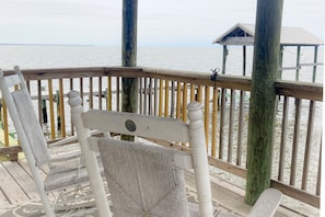 Sit on the covered dock and enjoy the weather and the scenery.