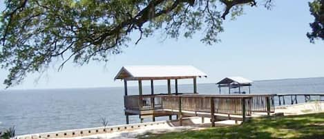 Quiet spot on Mobile Bay has covered dock