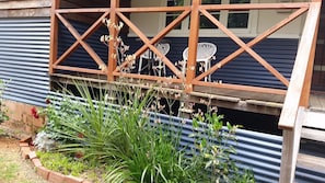 Sit. Enjoy the birds and sounds of nature. Front verandah.