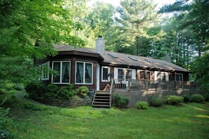 Rear Section of the house nestled in the woods